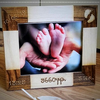 Wooden frame with birth elements 